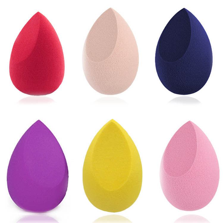 Beauty Blender - Colorful makeup applicator sponges in various shades including red, pink, blue, purple, and yellow.