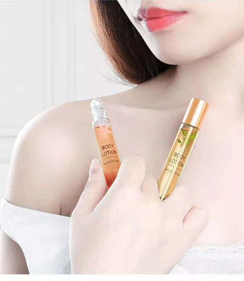 Delicate skin care products with natural ingredients, featuring woman's hands holding body lotion and essential oil.