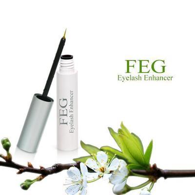 FEG Eyelash Enhancer - Natural botanical eyelash growth serum in silver bottle with black applicator on white background with spring flowers