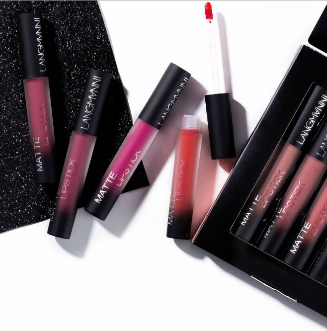 Matte Lipstick Waterproof Long-lasting Velvet Lipstick Set by 6ixDrips featuring assorted lipstick shades in a sleek black and silver packaging.