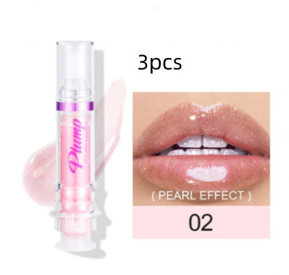 Pearlescent lip color set with 3 tubes of glossy, shimmer-infused lipgloss in a slightly spicy honey shade.