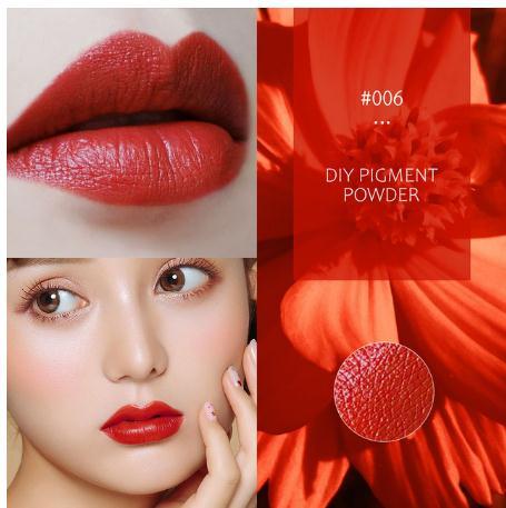 Captivating crimson lips against vibrant floral background - 6ixDrips' DIY Pigment Powder #006 creates striking, pigment-rich color for bold, alluring style.