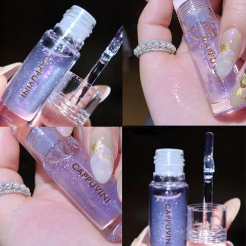 Transparent Moisturizing Lip Gloss - Iridescent, Sparkling Cosmetic Product in Female Hands