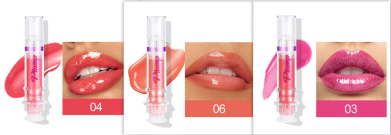 Assorted lip glosses in vibrant shades of red, coral, and pink displayed against a white background.