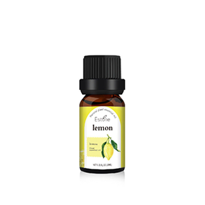 Lemon essential oil in glass bottle with black cap, displayed on a plain white background.