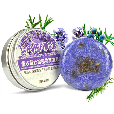 Fragrant lavender flowers and greenery surround a soothing lavender-infused skin care product in a circular container.