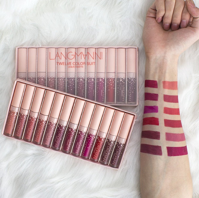 Matte Lipstick Waterproof Long-lasting Velvet Lipstick Set by 6ixDrips, displayed on a white fluffy surface with hand swatches.